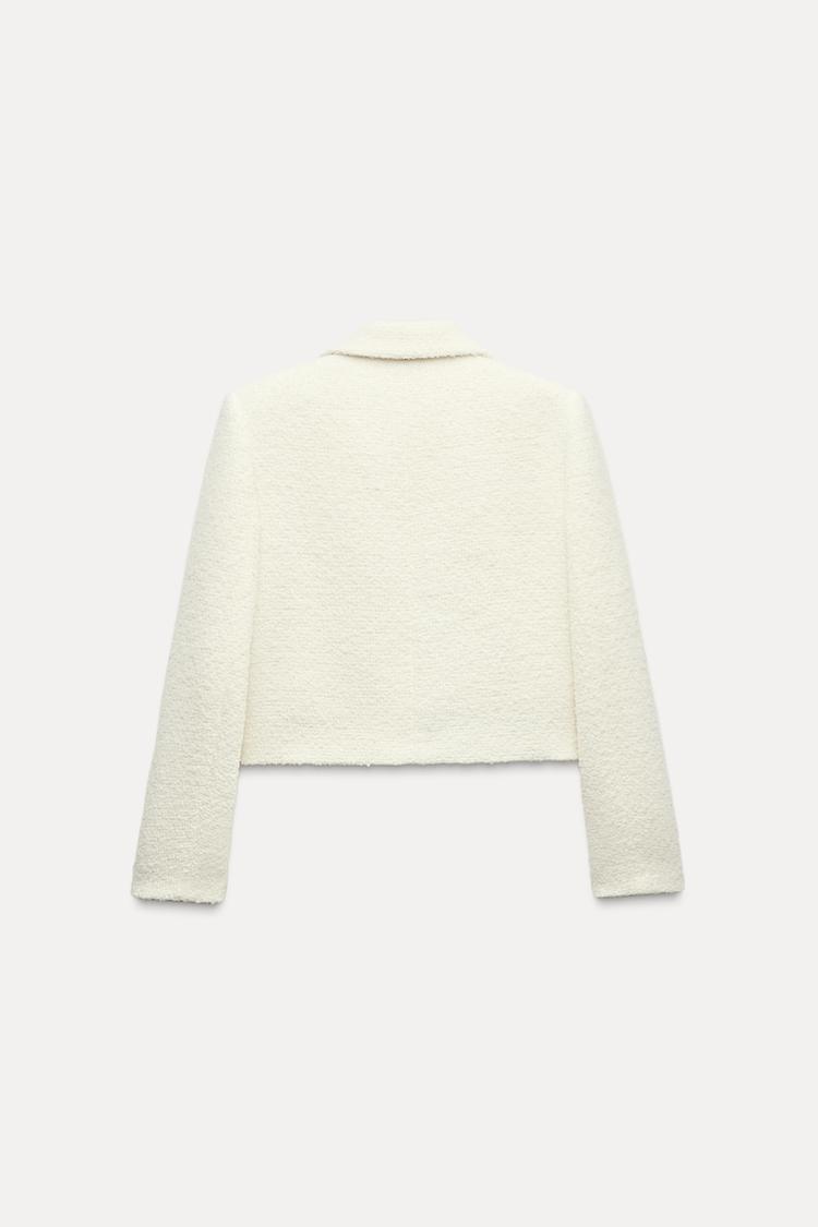 VESTE COURTE BOUCLÉE