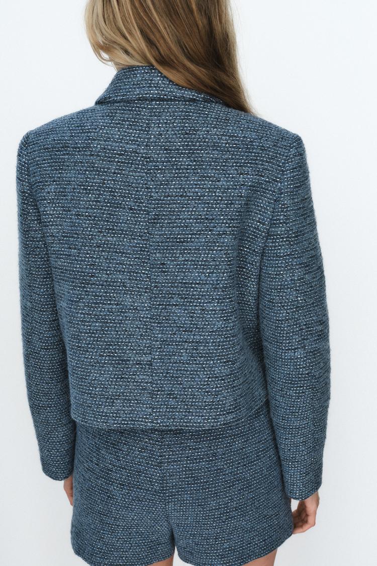 VESTE COURTE BOUCLÉE