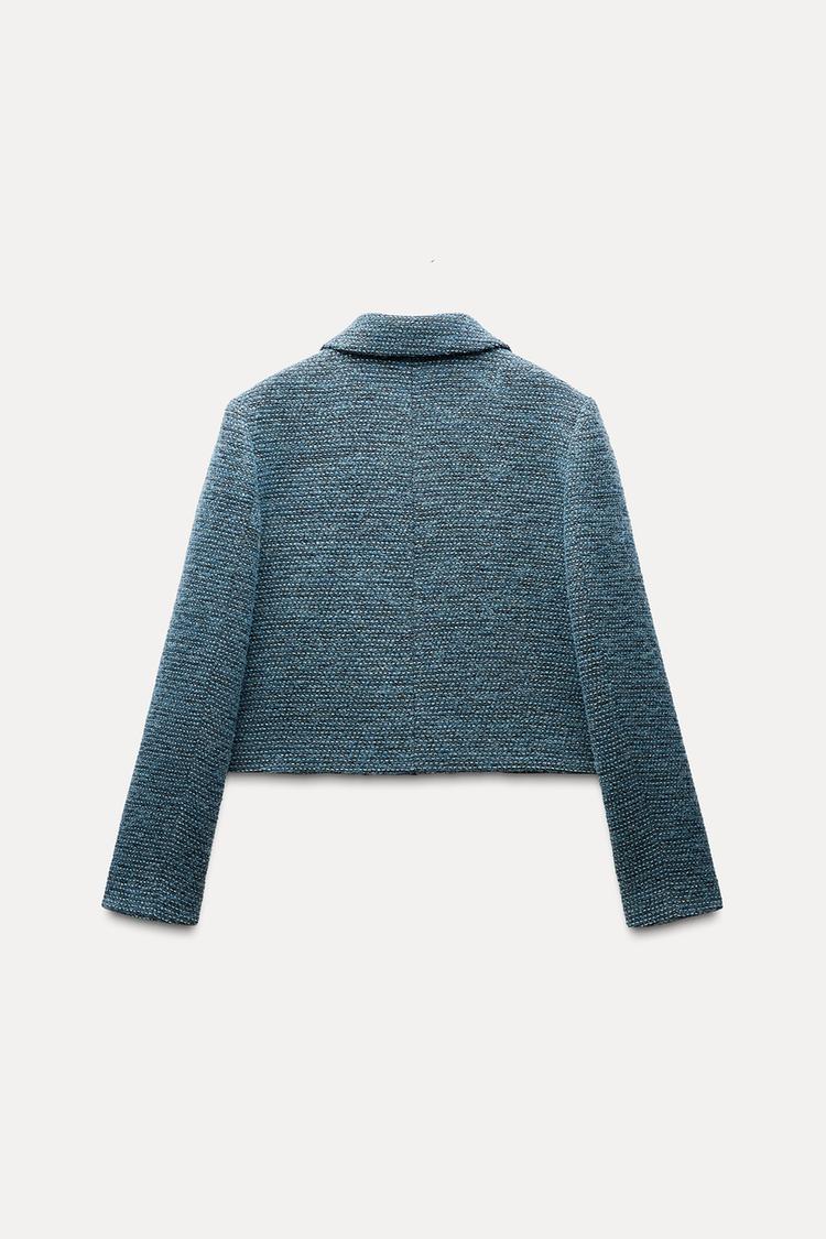 VESTE COURTE BOUCLÉE