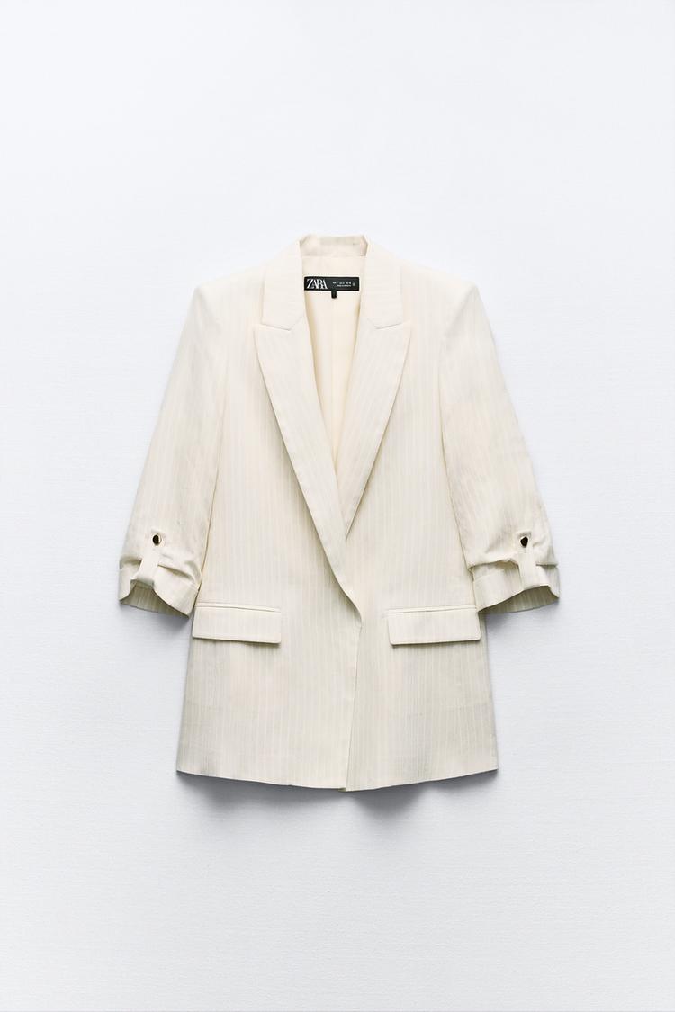 VESTE À MANCHES RETROUSSÉES ET RAYURES