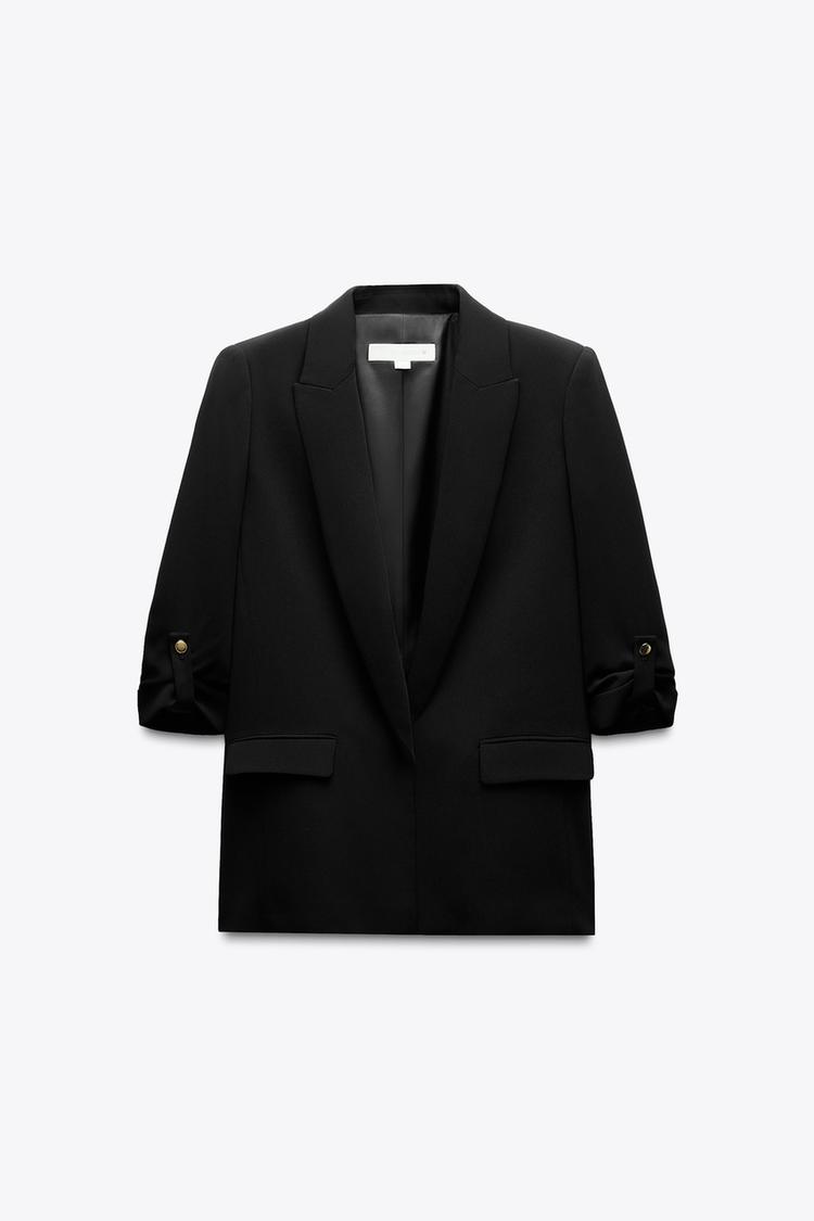VESTE À MANCHES RETROUSSÉES