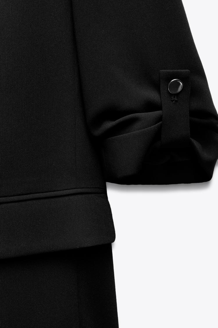 VESTE À MANCHES RETROUSSÉES