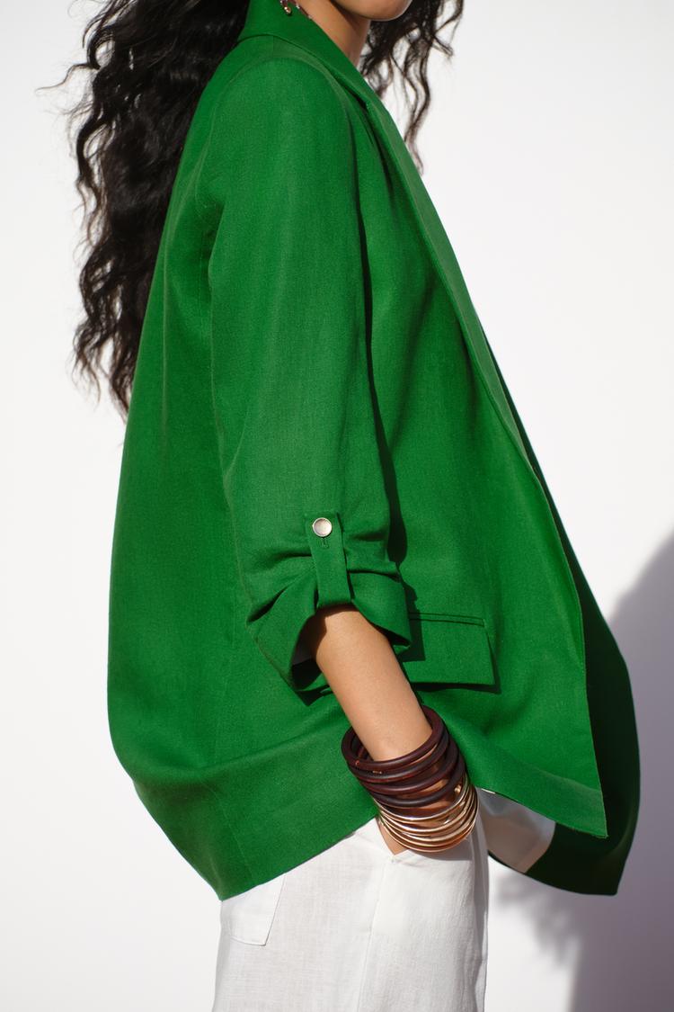 VESTE À MANCHES RETROUSSÉES