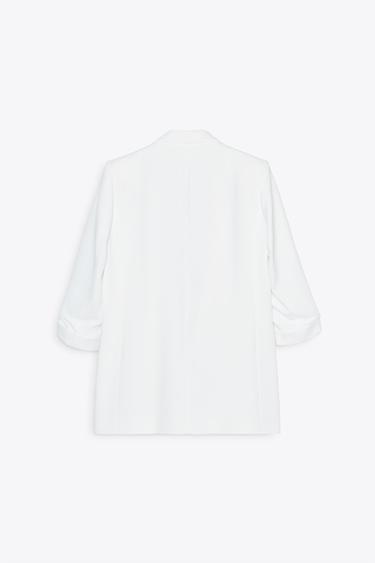 VESTE À MANCHES RETROUSSÉES