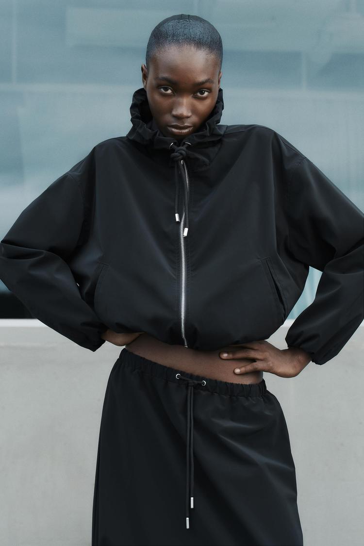 BLOUSON À CAPUCHE