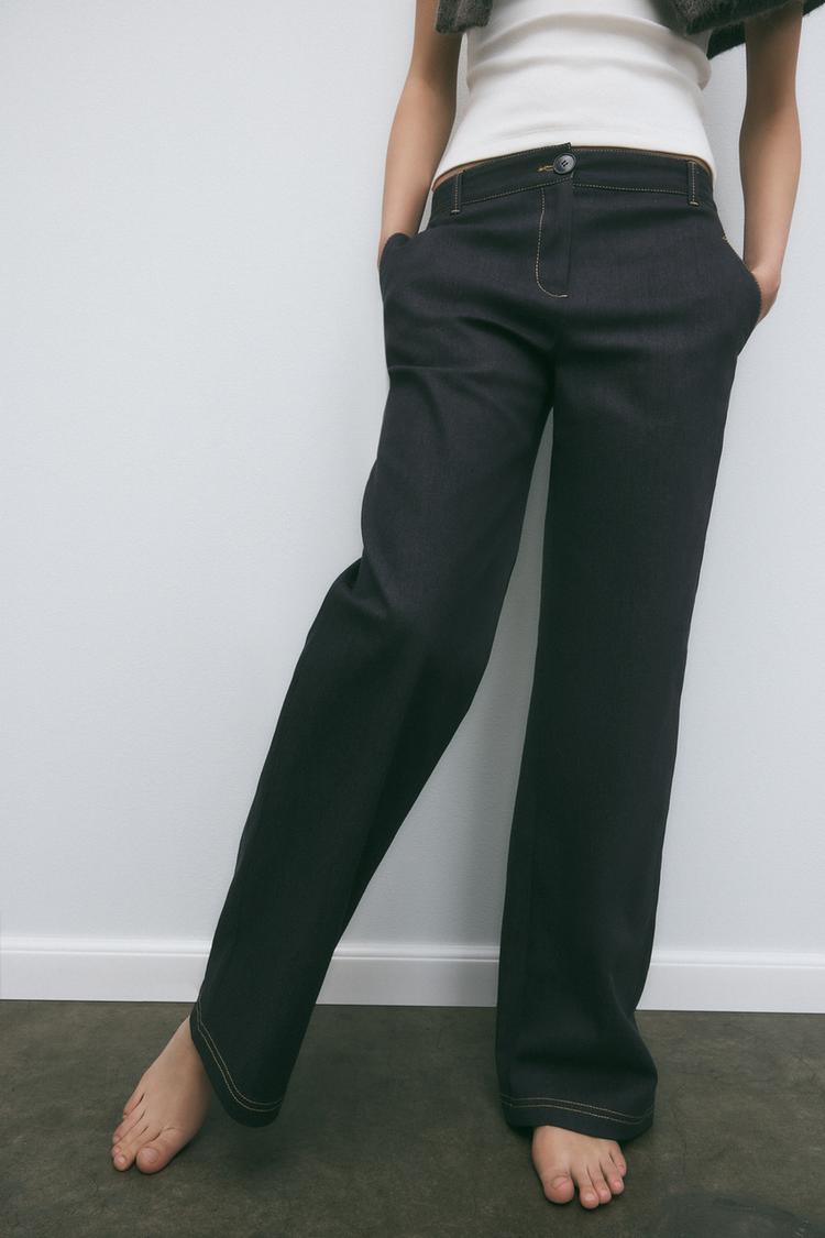 PANTALON BOOTCUT AVEC SURPIQÛRES EN MATIÈRES VARIÉES