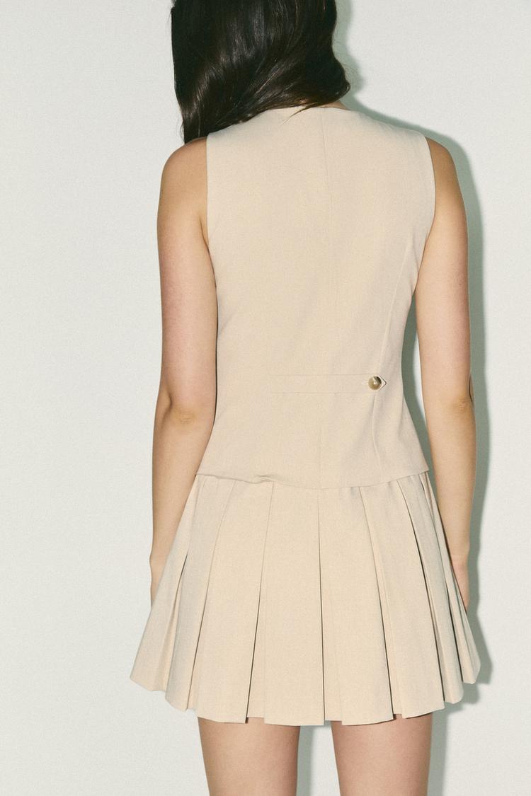 ROBE GILET À PLIS PLATS