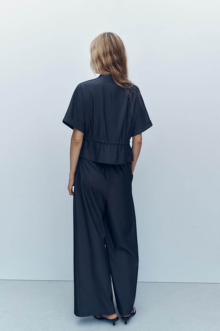 PANTALON LARGE À PINCES