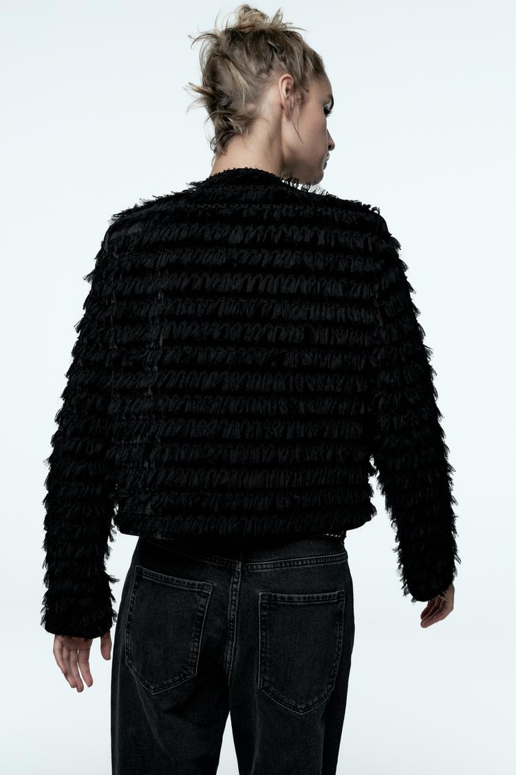 VESTE EN VELOURS À FRANGES