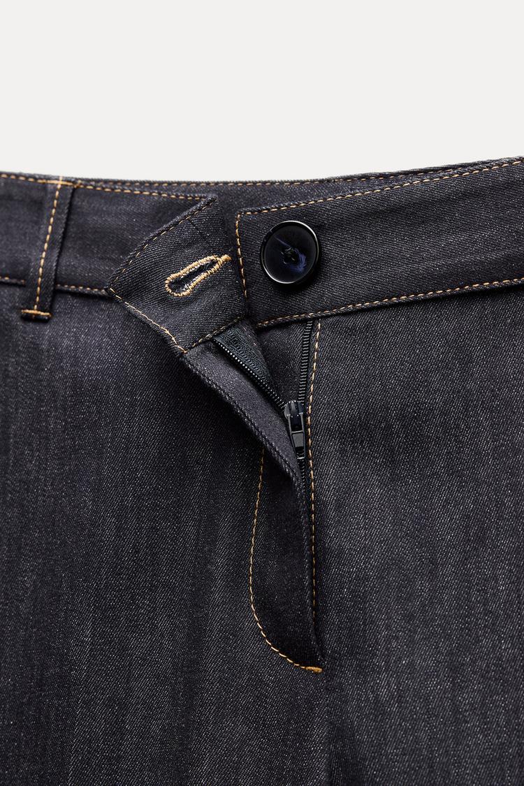 PANTALON BOOTCUT AVEC SURPIQÛRES EN MATIÈRES VARIÉES