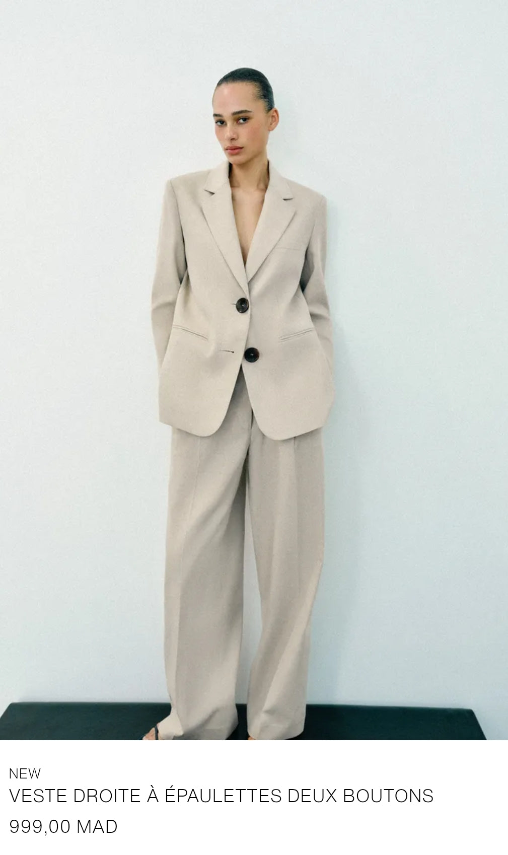 VESTE DROITE À ÉPAULETTES DEUX BOUTONS