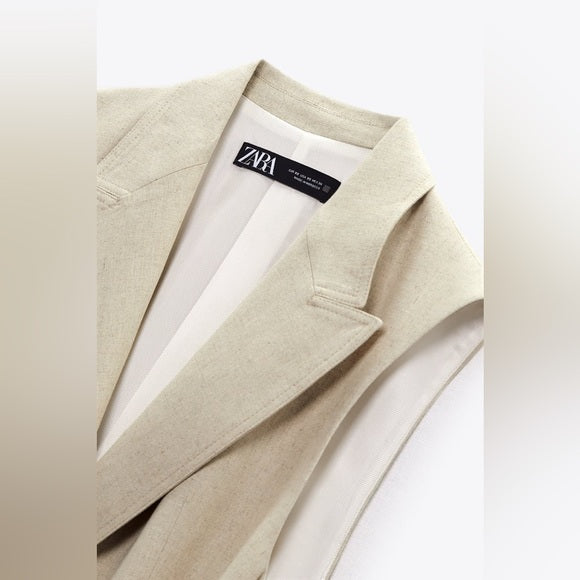 VESTE SANS MANCHES AVEC CEINTURE EN LIN