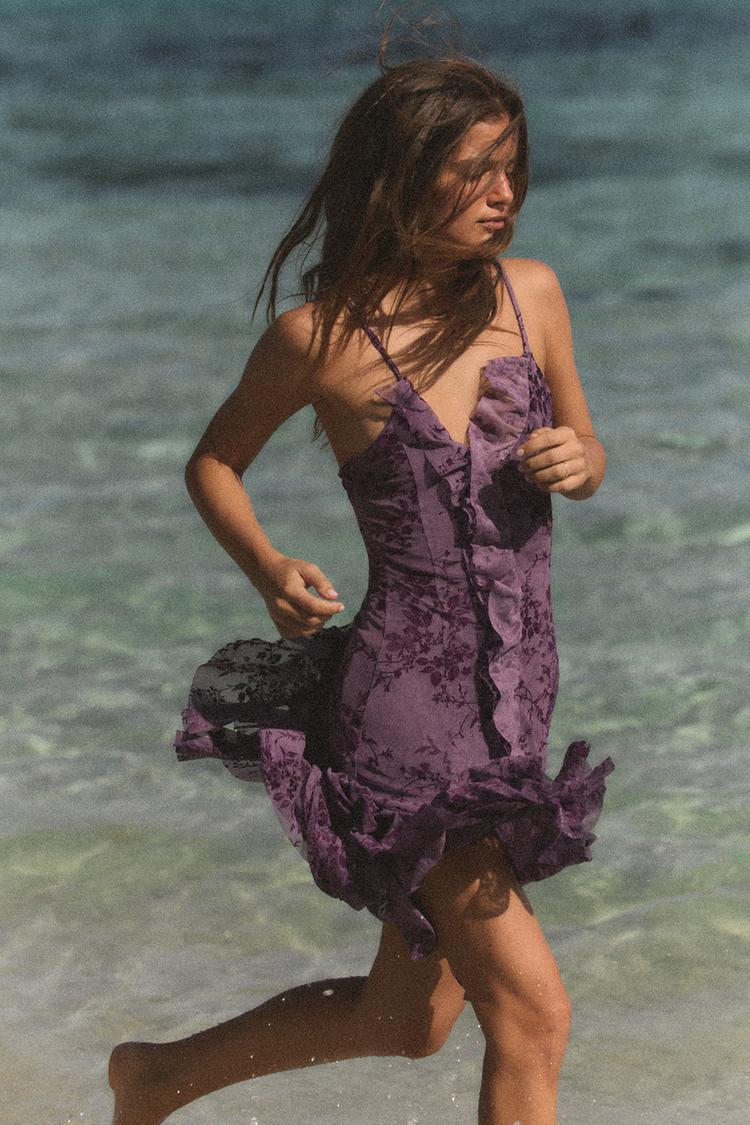 ROBE EN TULLE FLOQUÉE À VOLANTS