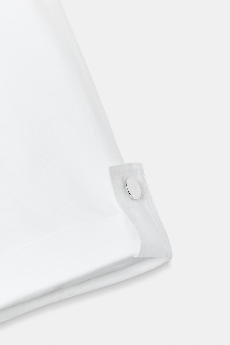 T-SHIRT ASYMÉTRIQUE BOUTON