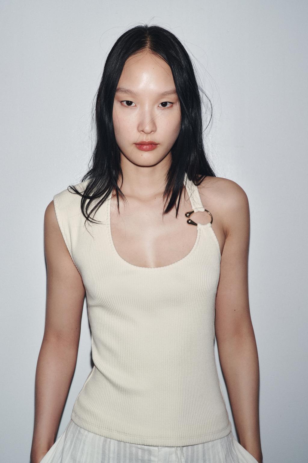 TOP CÔTELÉ PIÈCE MÉTALLIQUE