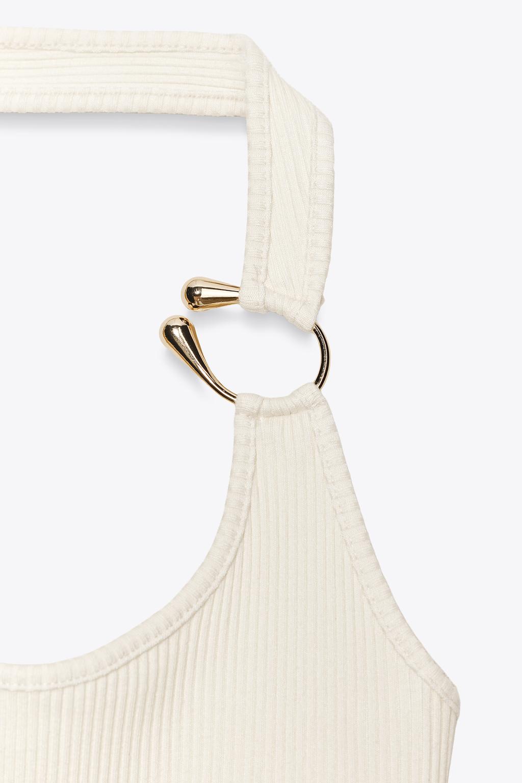 TOP CÔTELÉ PIÈCE MÉTALLIQUE