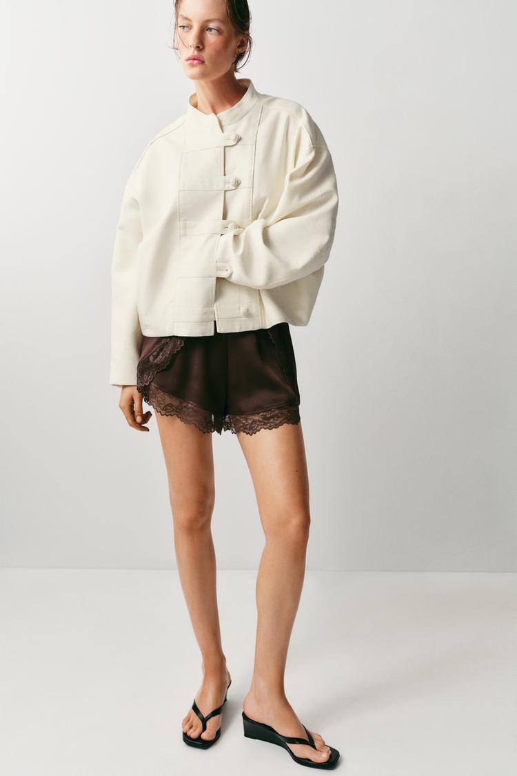 BLOUSON À BRANDEBOURGS ET LIN