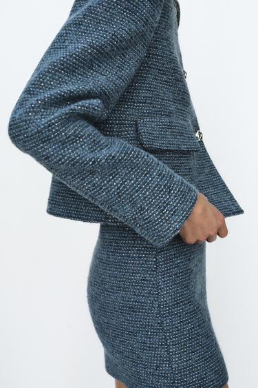 VESTE COURTE BOUCLÉE