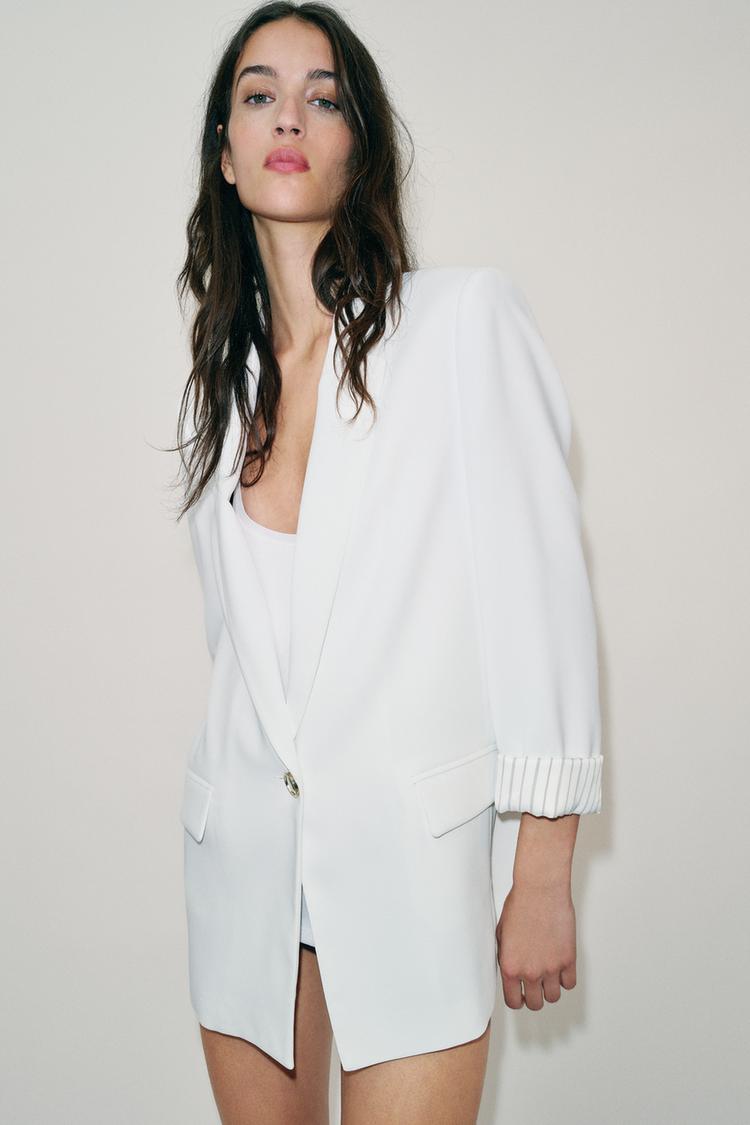 VESTE À MANCHES RETROUSSÉES ET POIGNETS IMPRIMÉS