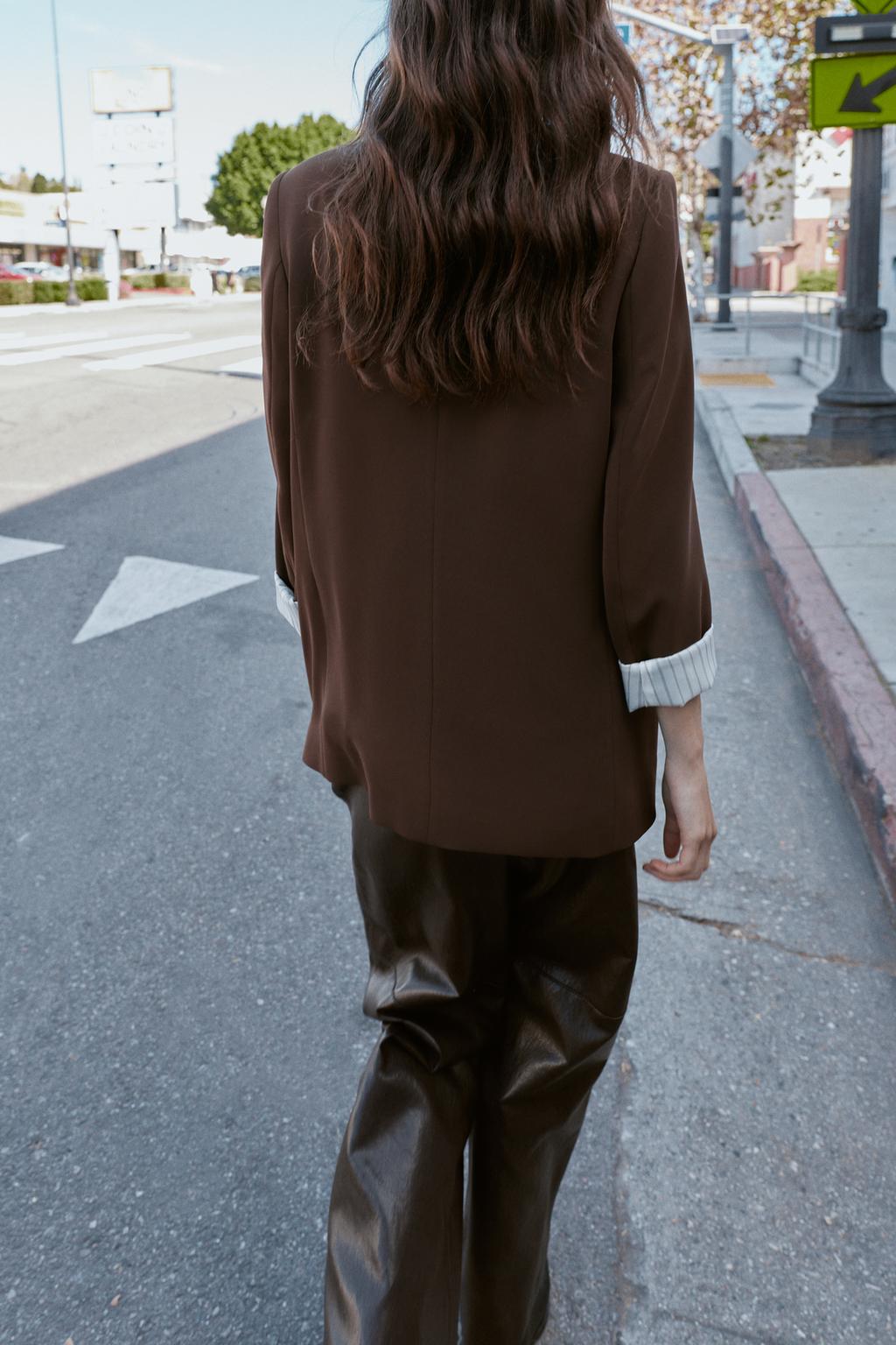 VESTE AVEC POIGNETS IMPRIMÉS