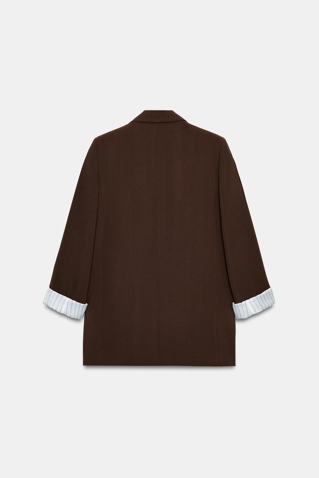 VESTE AVEC POIGNETS IMPRIMÉS