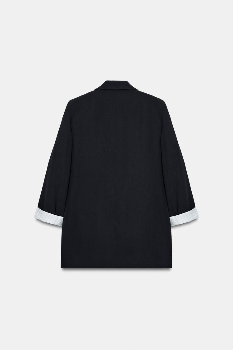 VESTE AVEC POIGNETS IMPRIMÉS