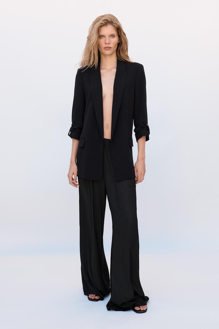 VESTE À MANCHES RETROUSSÉES