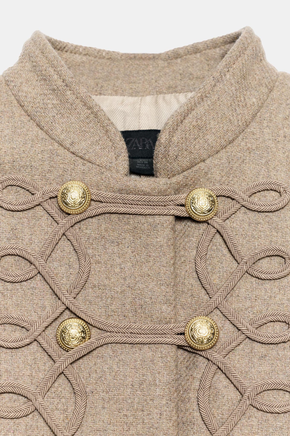 MANTEAU AVEC LAINE ET BRANDEBOURGS