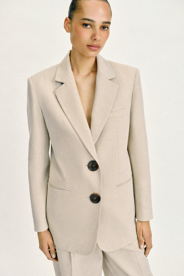 VESTE DROITE À ÉPAULETTES DEUX BOUTONS