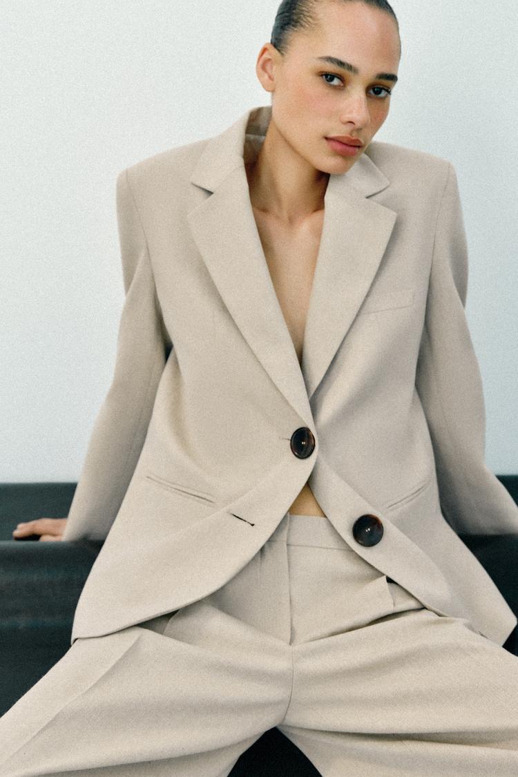 VESTE DROITE À ÉPAULETTES DEUX BOUTONS