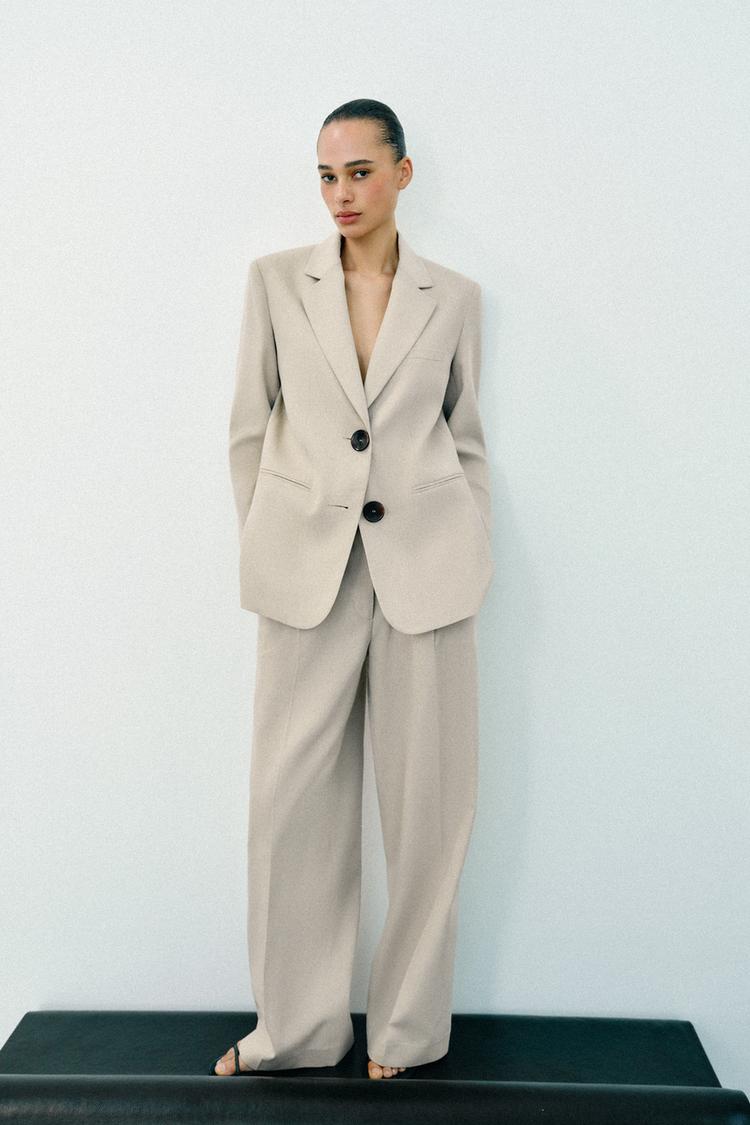 VESTE DROITE À ÉPAULETTES DEUX BOUTONS