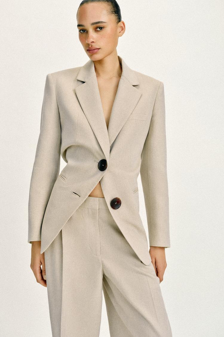 VESTE DROITE À ÉPAULETTES DEUX BOUTONS