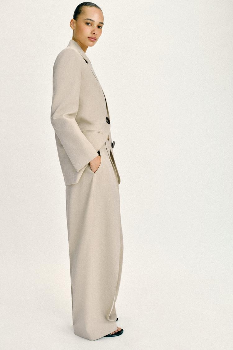 VESTE DROITE À ÉPAULETTES DEUX BOUTONS