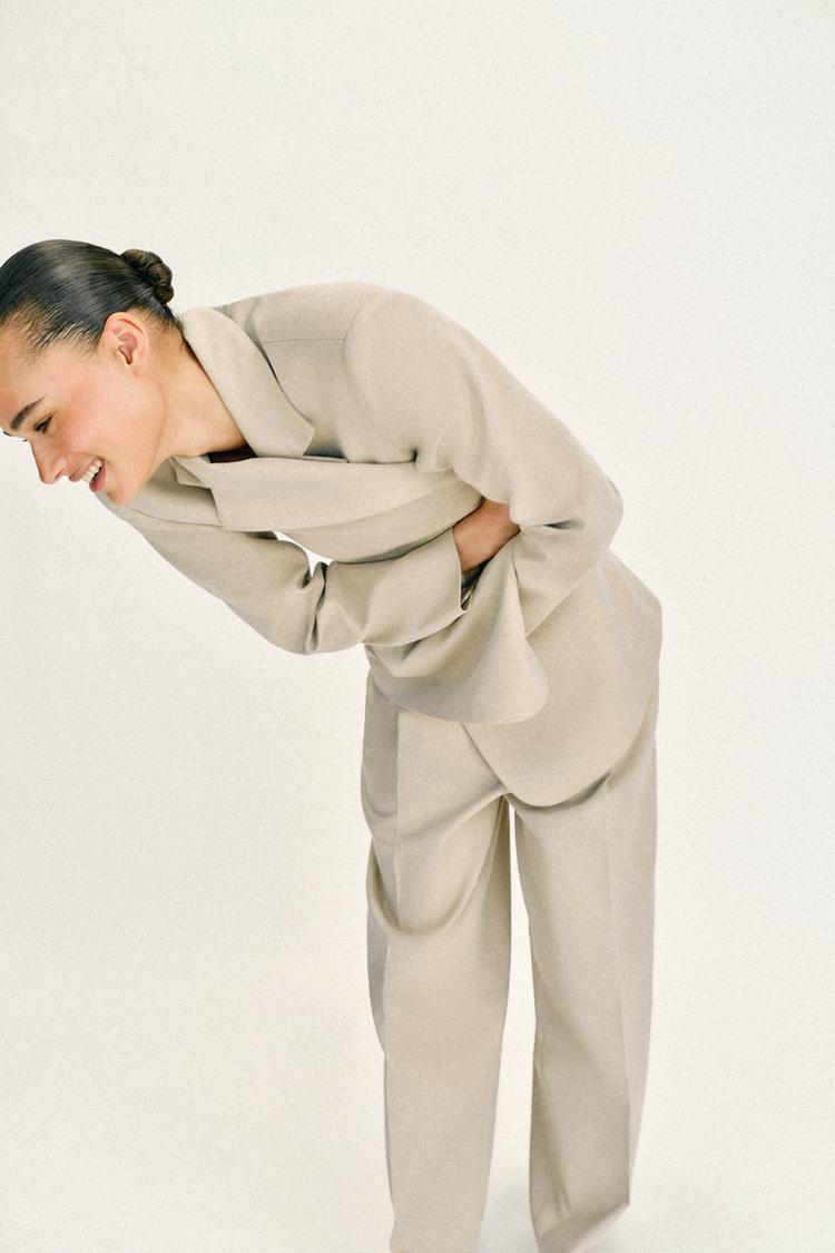 VESTE DROITE À ÉPAULETTES DEUX BOUTONS