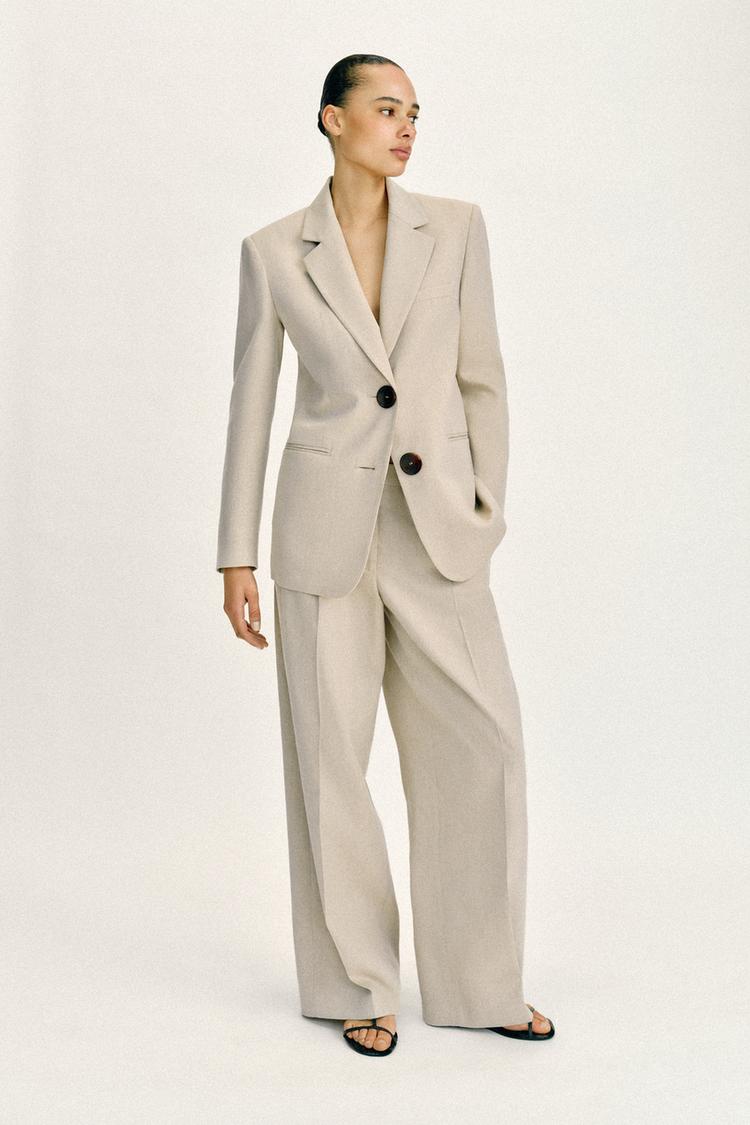VESTE DROITE À ÉPAULETTES DEUX BOUTONS