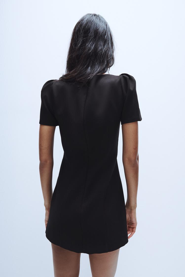 ROBE COURTE PLIS ET POCHES