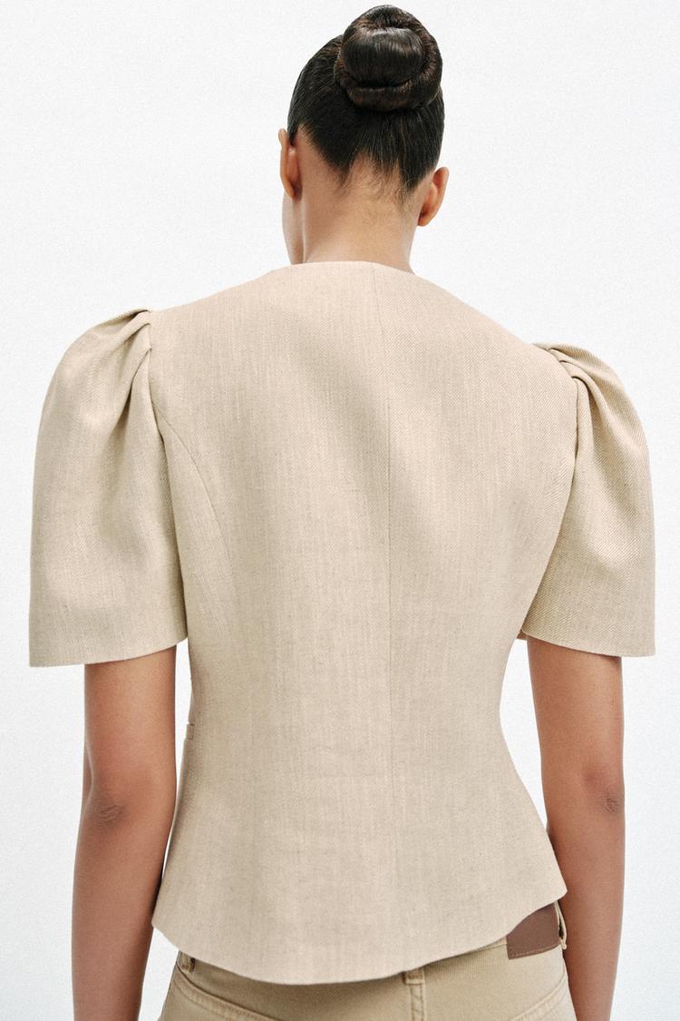 VESTE À MANCHES COURTES BOUFFANTES