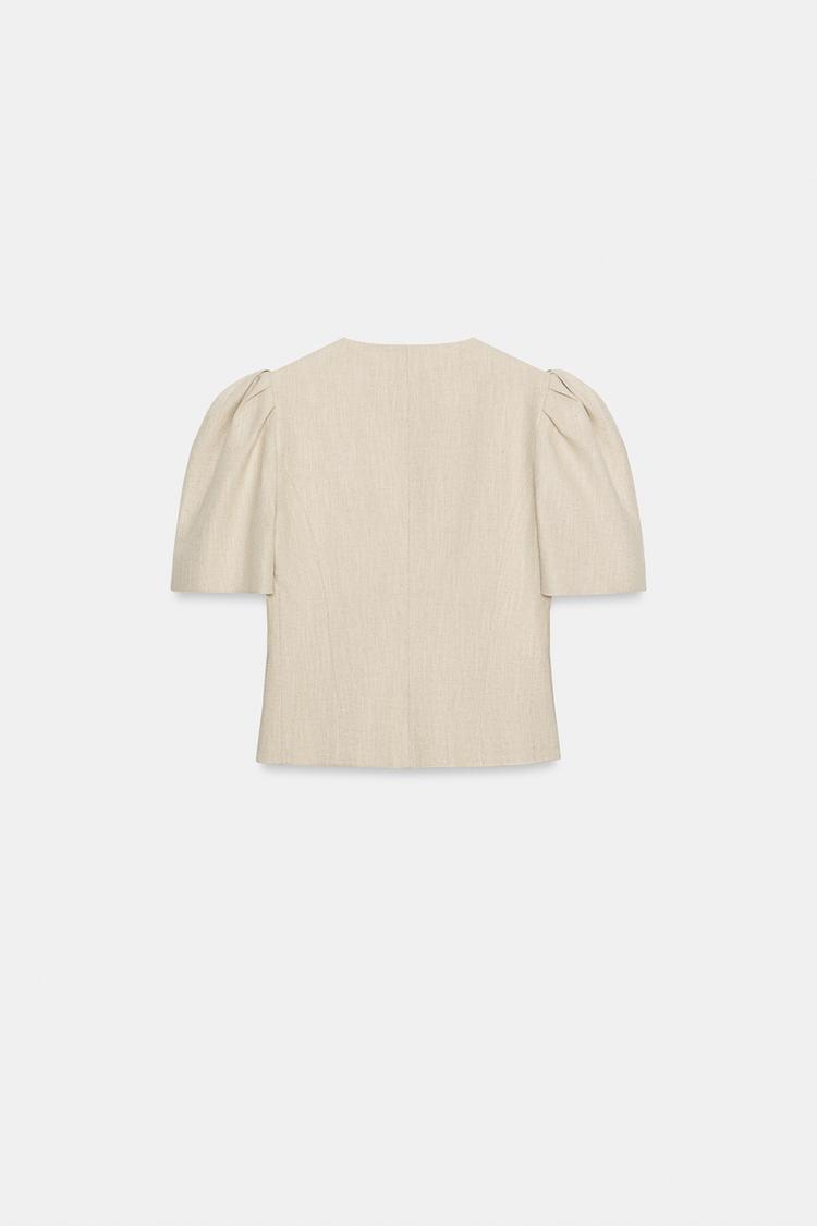 VESTE À MANCHES COURTES BOUFFANTES