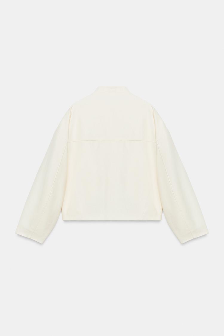 BLOUSON À BRANDEBOURGS ET LIN