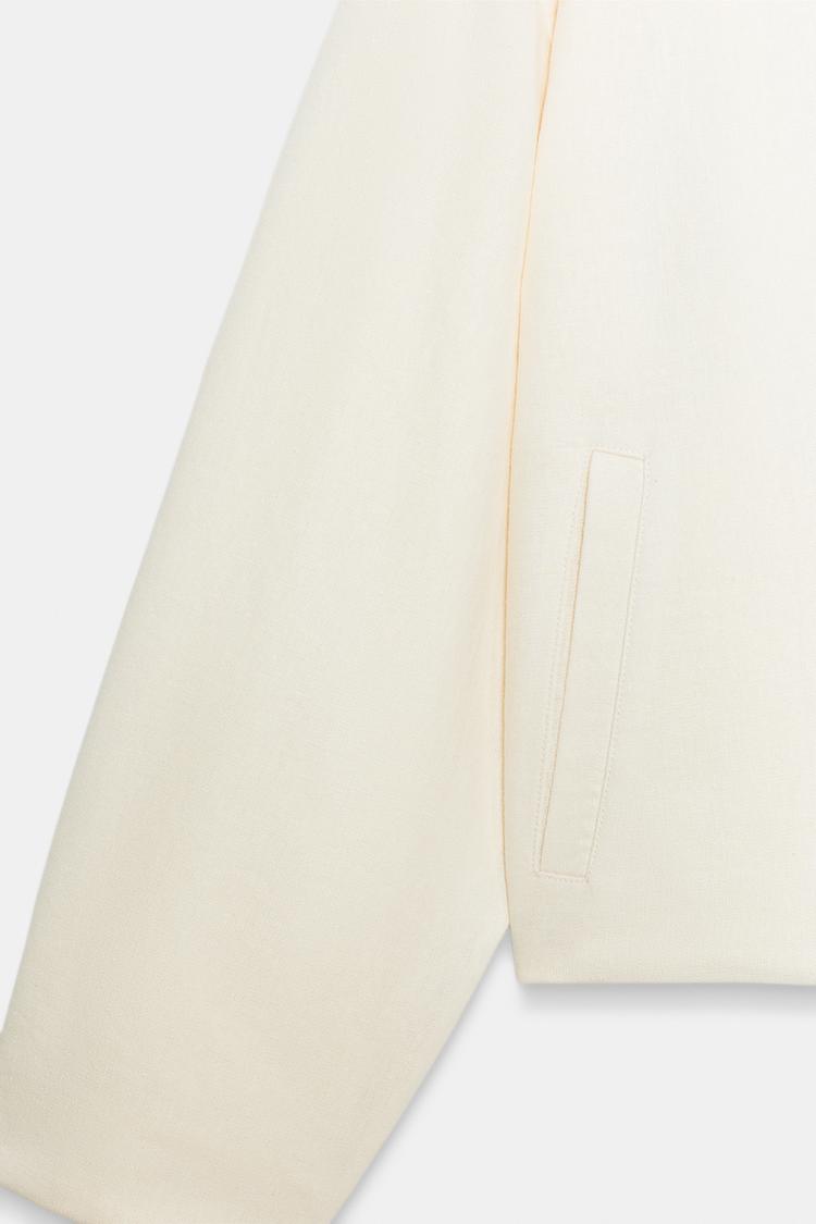 BLOUSON À BRANDEBOURGS ET LIN