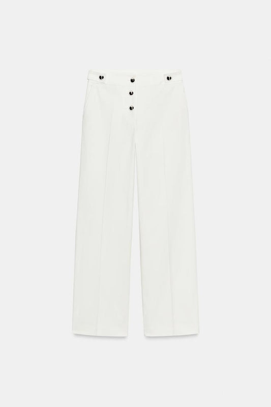 PANTALON À BOUTONS MÉTALLIQUES