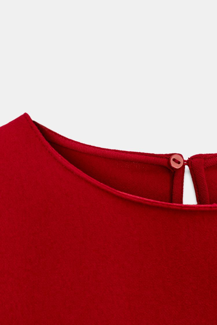 ROBE COURTE ASYMÉTRIQUE À ÉPAULETTES
