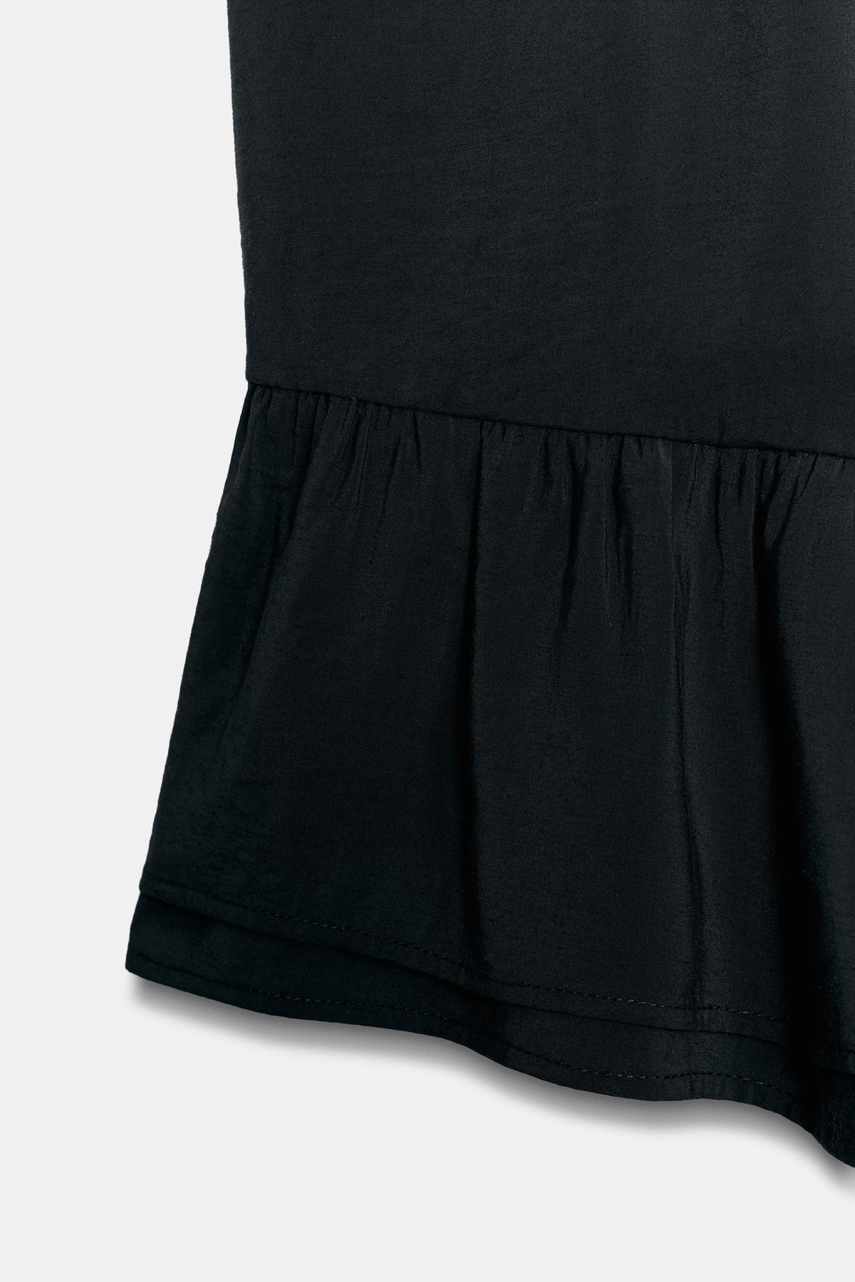 ASYMMETRIC RUFFLES TOP