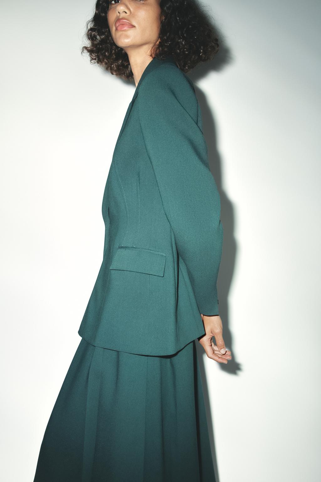 PLEATED MIDI SKIRT