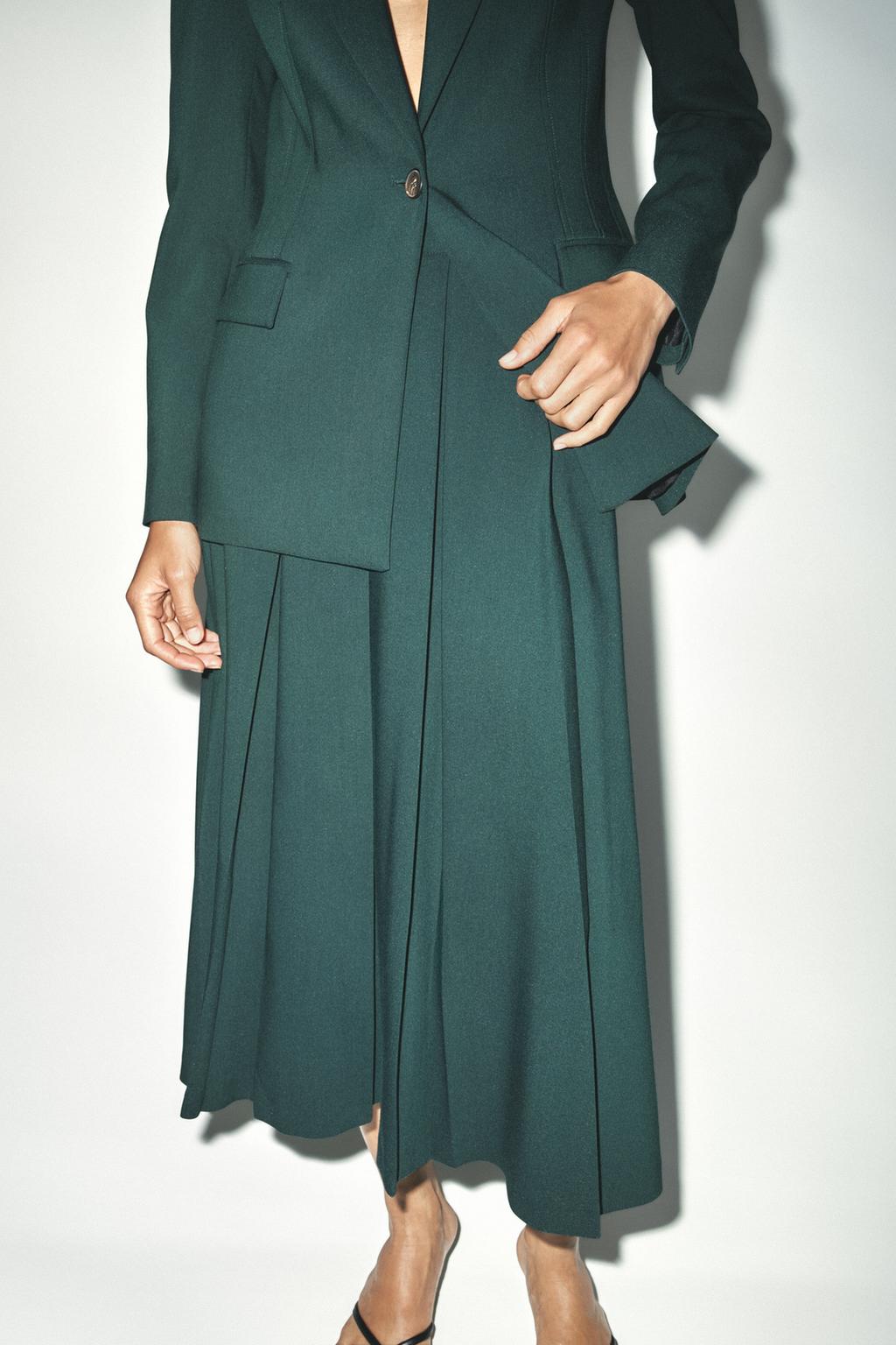 PLEATED MIDI SKIRT