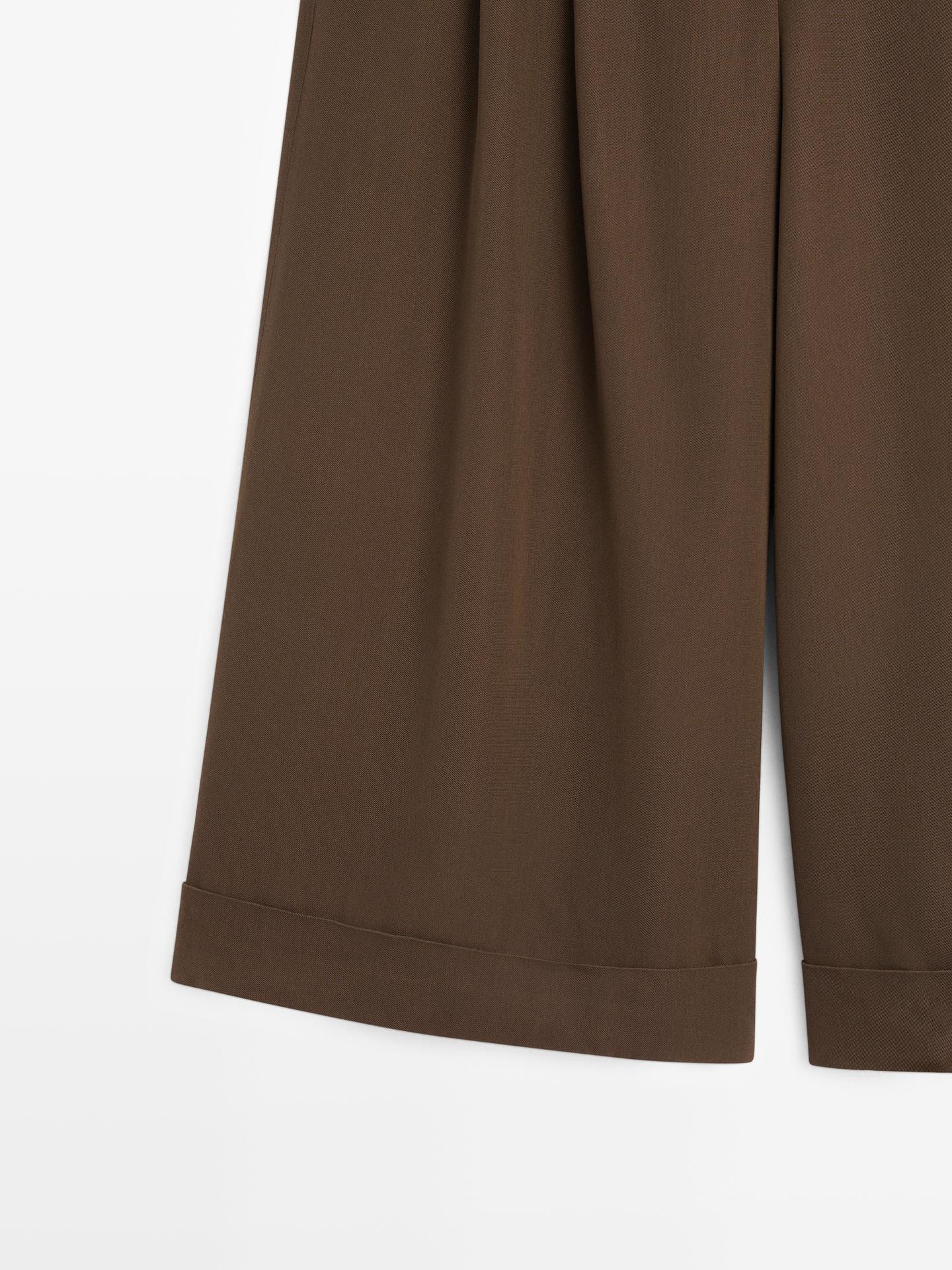 BERMUDA LONG AVEC OURLET