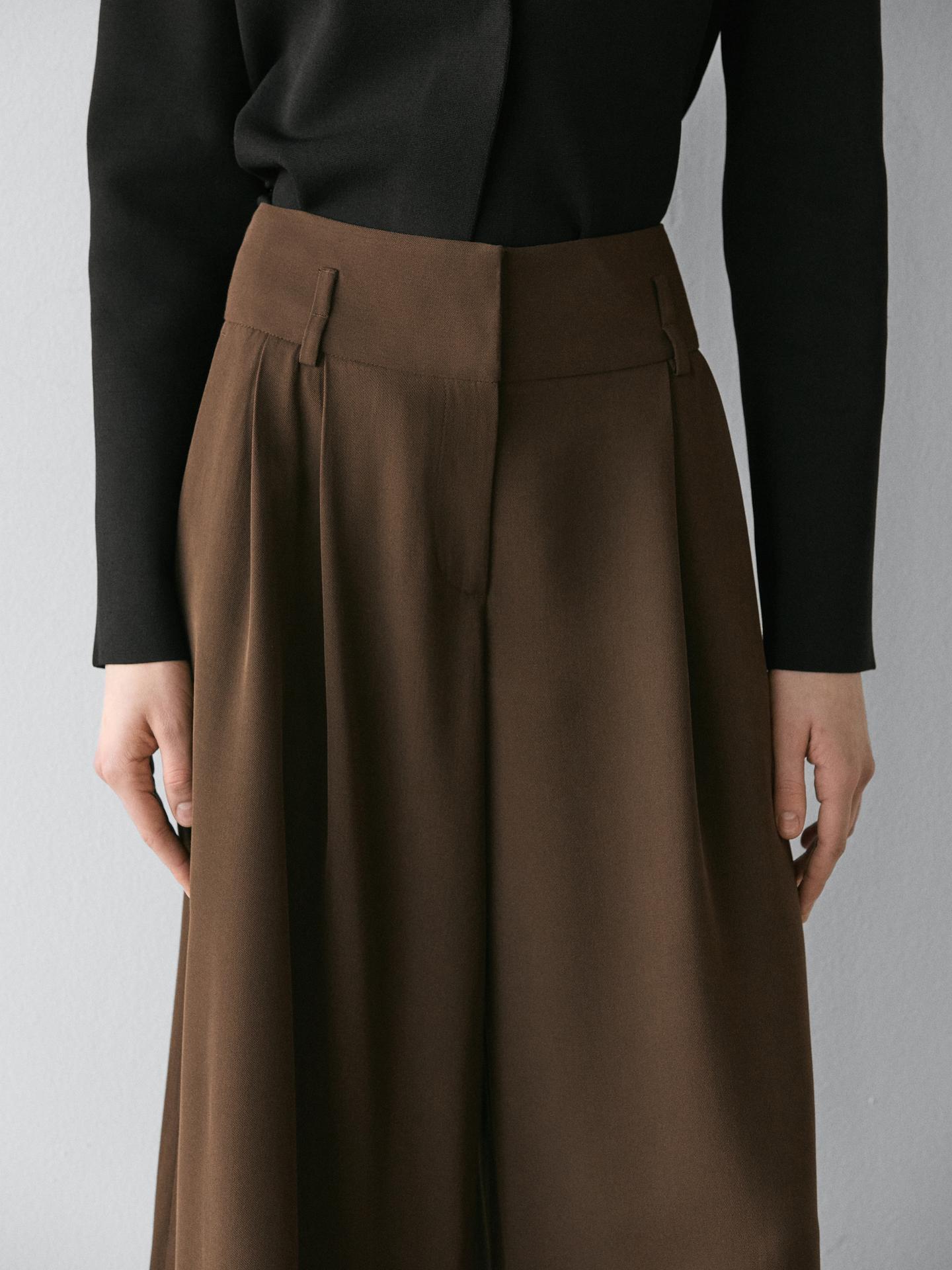 BERMUDA LONG AVEC OURLET