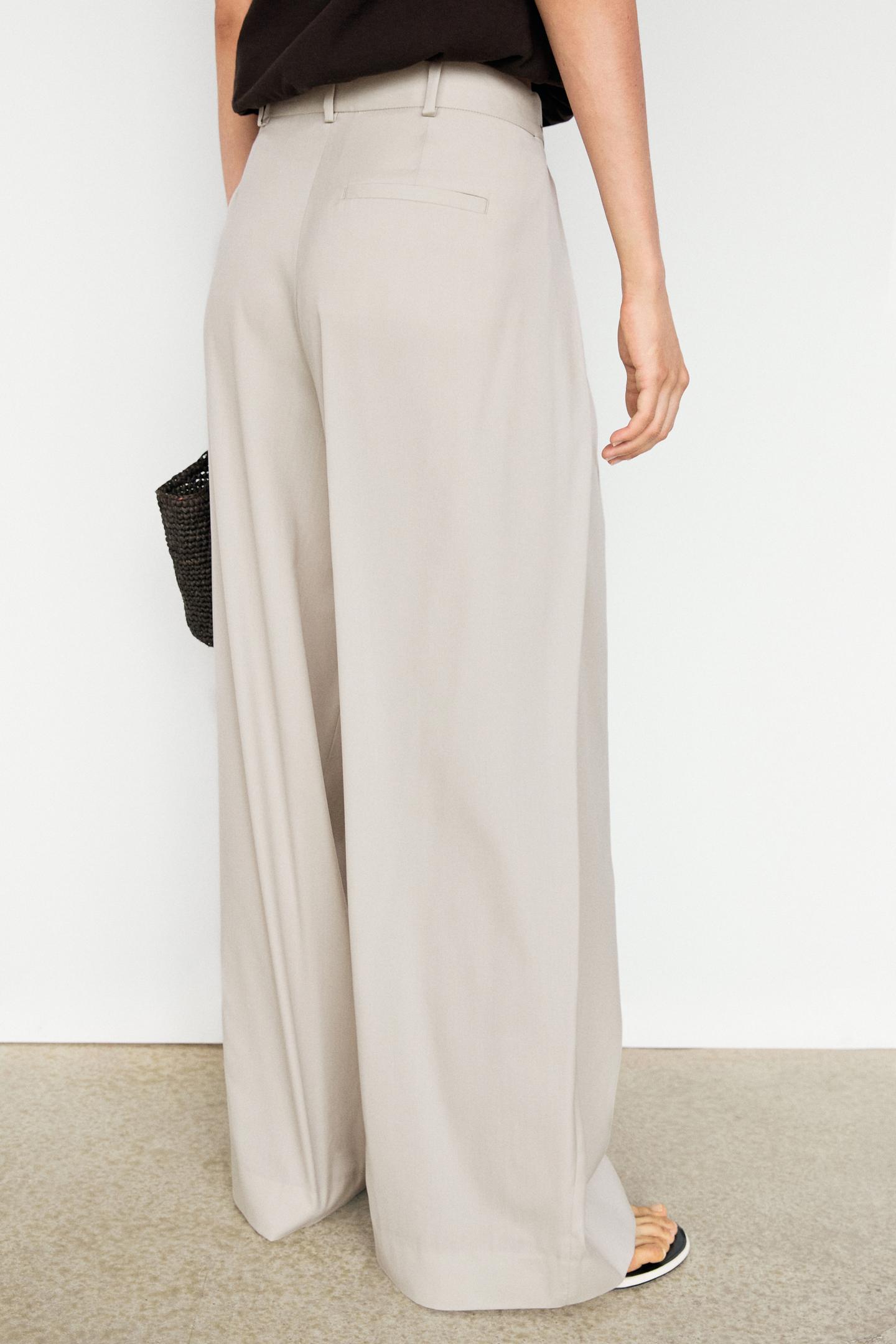 PANTALON EN LAINE MÉLANGÉE À PINCES ET BOUTONS