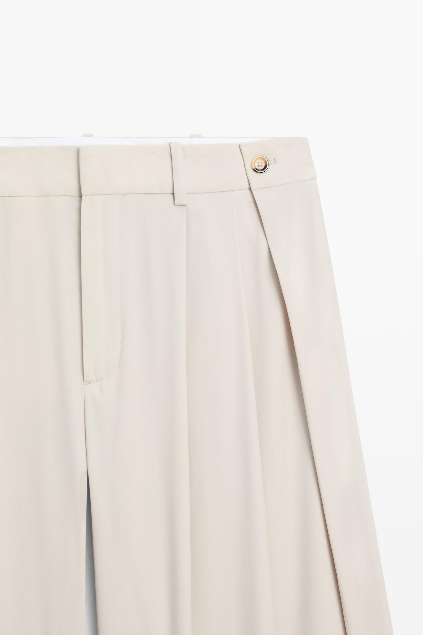 PANTALON EN LAINE MÉLANGÉE À PINCES ET BOUTONS