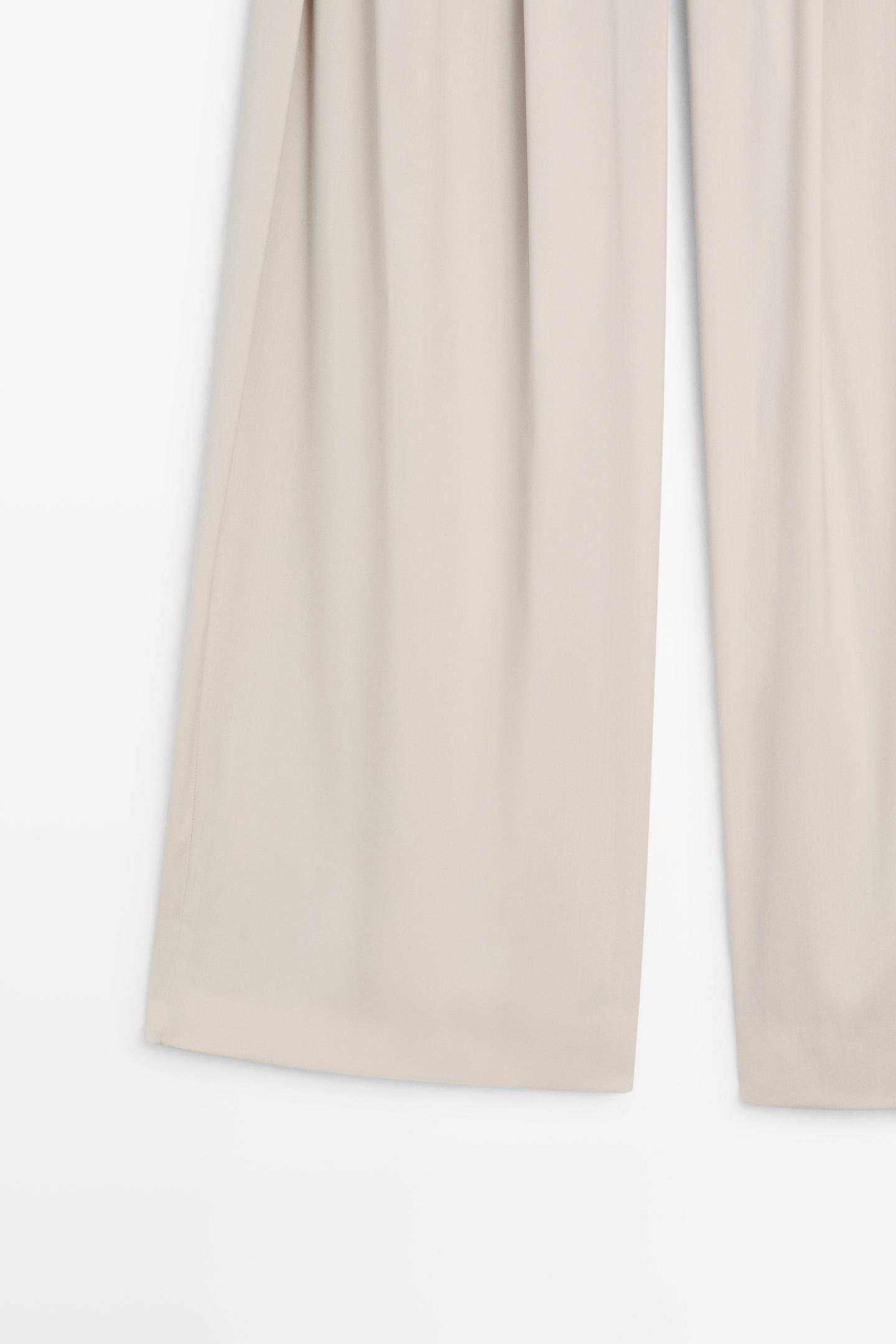 PANTALON EN LAINE MÉLANGÉE À PINCES ET BOUTONS